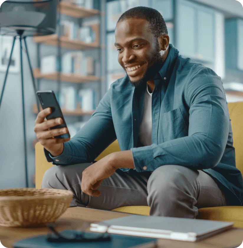 Man sitting with phone in hand